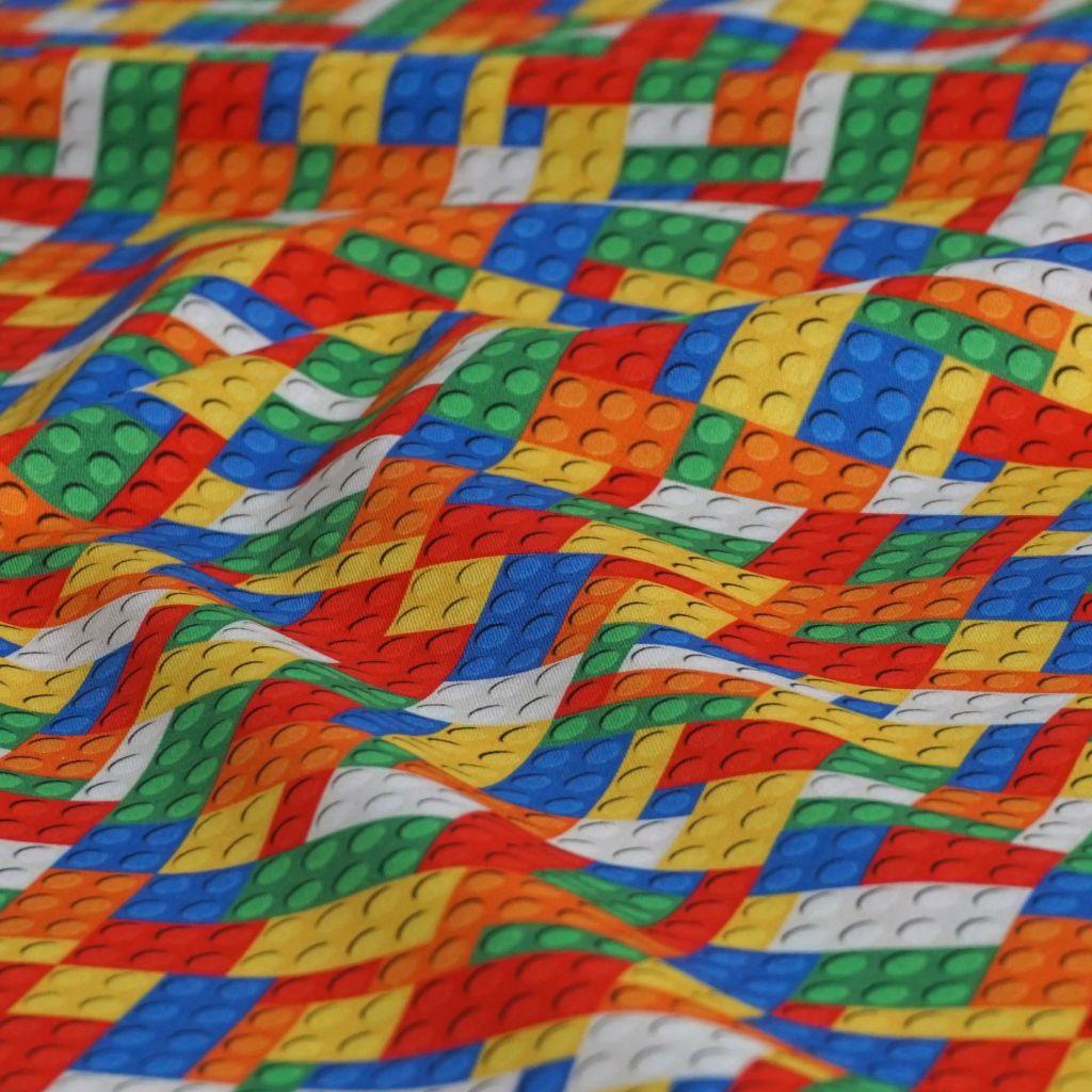 Baumwollstoff Motivdruck Bausteine bunt